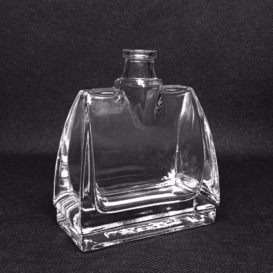 Factory Price Beautiful Design Round Perfume Glass Bottle in 50 Ml Perfume Bottle Glass Cosmetic Packaging Bottle China Manufacturer